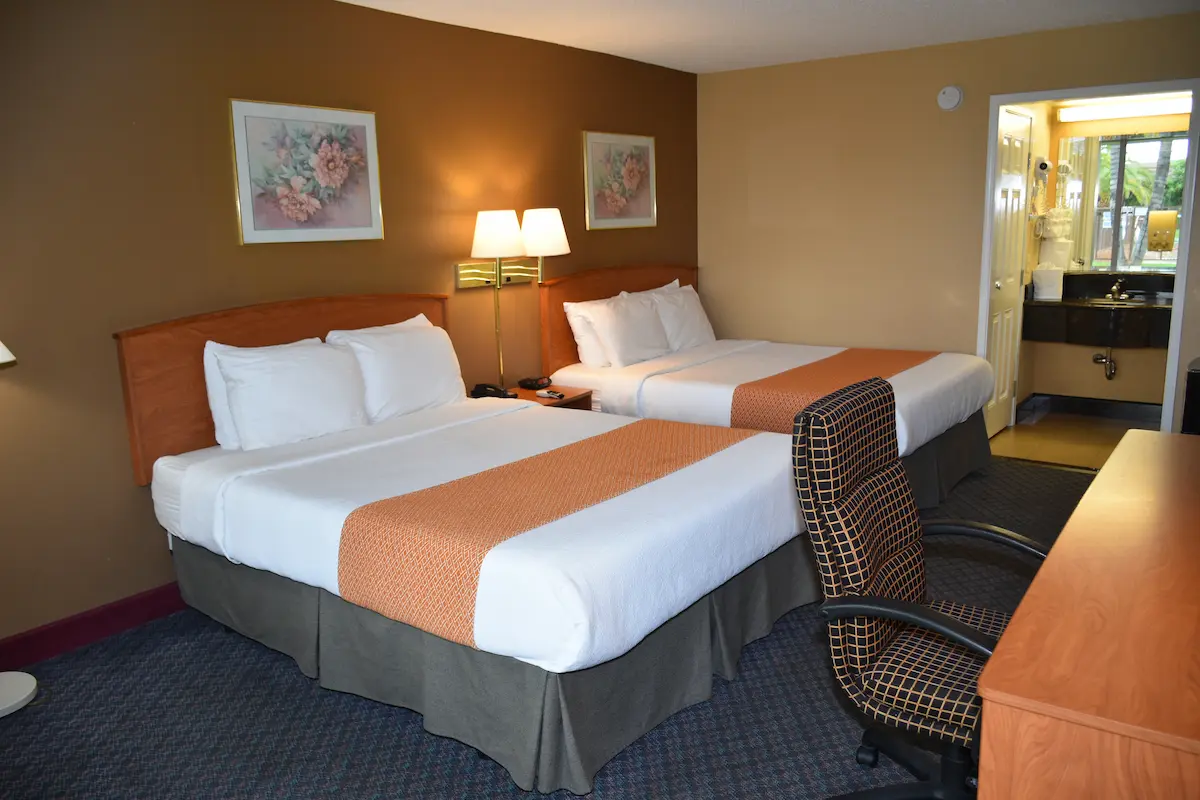 Deluxe Two Queen room bed photo